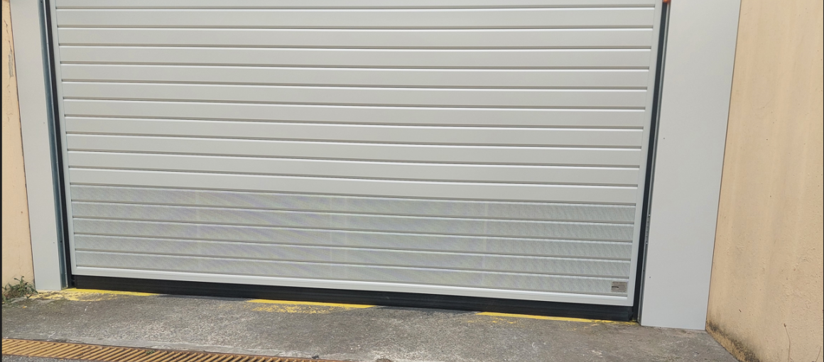 Remplacement porte de garage de la résidence "Sainte Marguerite"